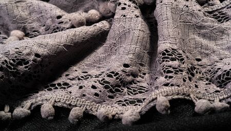 Texture background, female lace scarf. Arrived quickly and beautifully, silver color. The scarf is thin but very attractive and very well made with no loose yarn or loose parts.の写真素材