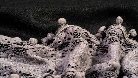 Texture background, female lace scarf. Arrived quickly and beautifully, silver color. The scarf is thin but very attractive and very well made with no loose yarn or loose parts.の写真素材