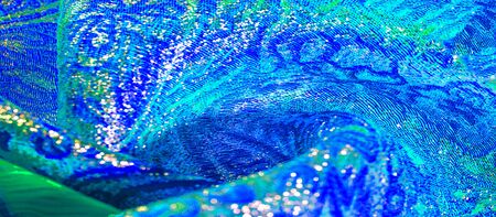 Texture background, pattern. blue brocade fabric. Organza brocade fabric - shepherd, with a crunchy...