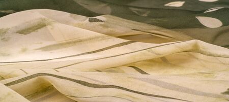 Background texture. Women's olive-colored scarf Photography for your projects from pashmina Stolen...