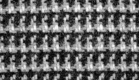Background texture, pattern. The fabric is thick, warm with a checkered pattern, gray black. This is...