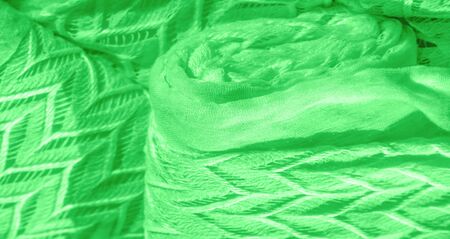 Texture, background, pattern, silk fabric, green, layered lace tulle, premium plain winter diamond knitted scarf in the form of infinity loopsの写真素材