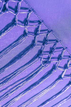 Background texture of silk fabric. This is a natural purple blue scarf, this beautiful nylon satin...