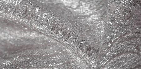 Texture background, pattern. white brocade fabric. Organza brocade fabric - shepherd, with a crunchy...