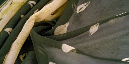 Background texture. Women's olive-colored scarf Photography for your projects from pashmina Stolen...
