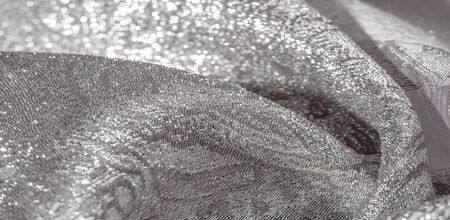 Texture background, pattern. white brocade fabric. Organza brocade fabric - shepherd, with a crunchy...