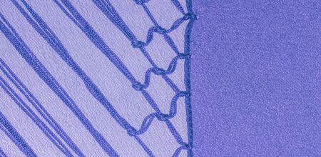 Background texture of silk fabric. This is a natural purple blue scarf, this beautiful nylon satin...