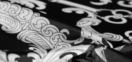 texture, background, black silk fabric with a monogram pattern Exquisite pattern of filigree fabric your design will delight you for a long timeの写真素材