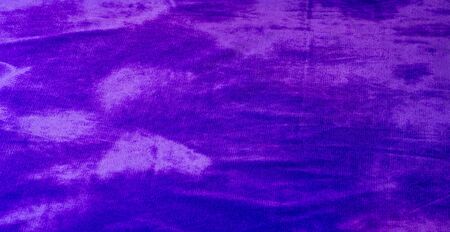 Picture. Texture, background. The velvet fabric is blue, the rich, rich color and luster of this luxurious velvet will add sophistication to any design style..の写真素材