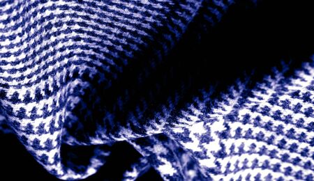 Background texture, pattern. The fabric is thick, warm with a checkered pattern, blue. Stop. You made the right choice by purchasing this photo, your design will be great with this image.の写真素材