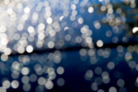 The photo is blurred, raindrops on the car paintworkの写真素材