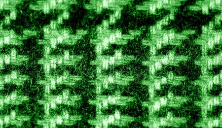 Background texture pattern. The fabric is thick, warm with a checkered pattern green This soft...