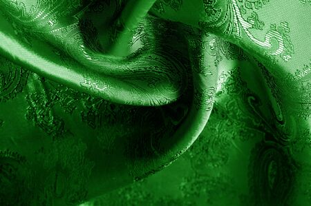 texture, background, green, verdant, lawny, vealy, virid,  blushful fabric with a paisley pattern. based on traditional Asian elementsの写真素材
