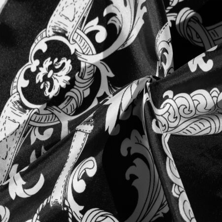 texture, background, black silk fabric with a monogram pattern Exquisite pattern of filigree fabric your design will delight you for a long timeの写真素材