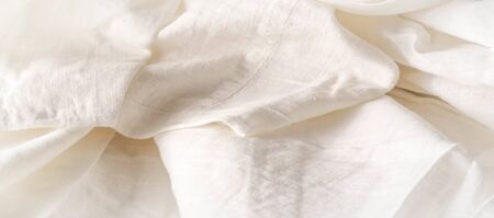 Background texture. Template. servants cloth white. White plaids are combined with a soft, textured hand, which makes this transparent underwear just a must for teasing spring and summer creations.の写真素材