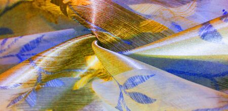 texture,  background. Metallic silk fabric. Ideal for adding elegance to your design. wallpaper, decor items and more! This textured fabric has a slight sheen. Features metallic and pearl threads.の写真素材