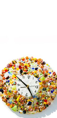 Sale of different clocks on the flea market. a mechanical or electrical device for measuring time, indicating hours, minutes, and sometimes seconds, usually by hands on a round.の写真素材