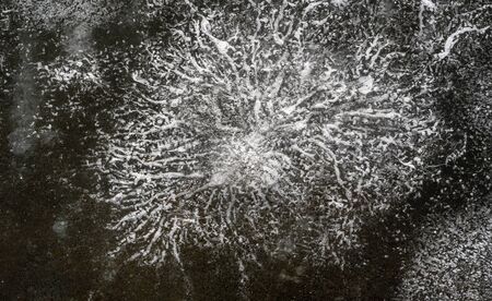 There is frost on the street, ice on the river, ice bubbles stuck in ice, unusually colorful ice...