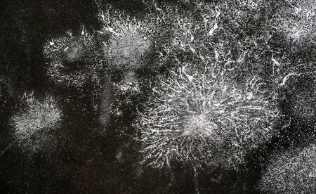 There is frost on the street, ice on the river, ice bubbles stuck in ice, unusually colorful ice...