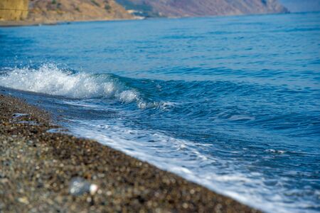 Shallow depth of field, Light wind, Waves, local weak coastal wind blowing during the day from the...