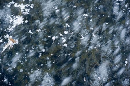 Texture pattern background white Winter, river ice air bubbles stagnant. drawing on ice frost...