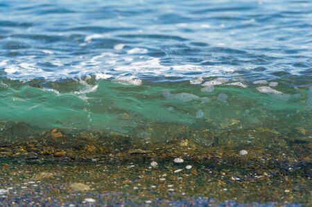 Shallow depth of field, Light wind, Waves, local weak coastal wind blowing during the day from the...