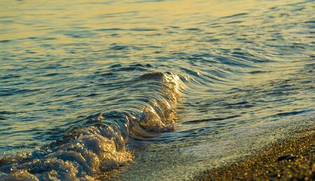 Shallow depth of field, Light wind, Waves, local weak coastal wind blowing during the day from the sea to land and at night from landの写真素材