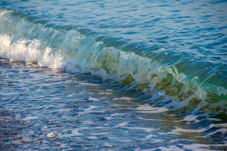 Shallow depth of field, Light wind, Waves, local weak coastal wind blowing during the day from the...