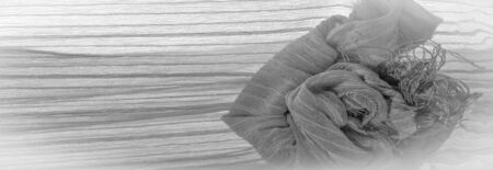 Texture, background, pattern, silk fabric of gray steel color with small corrugation, ground, context, fond, foil, fieldの写真素材