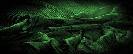 Texture, background, pattern, Crepe deep green, is a fabric of silk, wool or synthetic fibers with a...