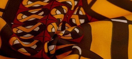 Background texture. silk bright fabric Mosaic geometric shapes Composition with colorful stained...
