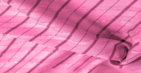 Design background texture, red cerise fabric with lurex stripes, perfect for a fresh and comfortable style.の写真素材