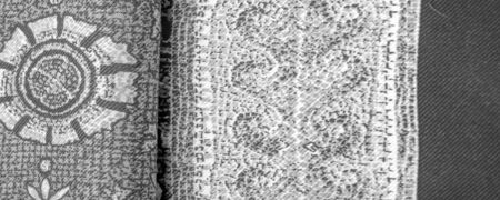 Background design texture, black and white, silk fabric with white drawings of flowers circles....