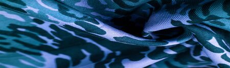 Background design texture, blue silk fabric, abstraction, copyright print, military camouflage fleece fabric, your designs will allow you to be military,の写真素材