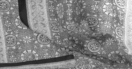 Background design texture, black and white, silk fabric with white drawings of flowers circles....
