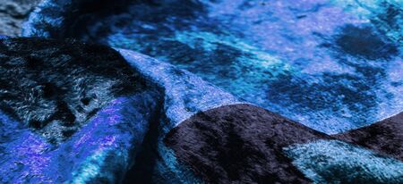 Texture, background, pattern, design, blue velvet fabric, dense fabric of silk, cotton or nylon with a thick short pile on one side.の写真素材
