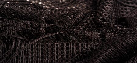 Texture, background, design, shawl from black female lace, crochet from black lace, fringe, hand...
