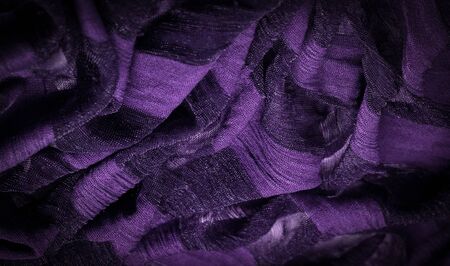 Texture, background, design, light transparent silk fabric of violet color, Soft-touch material is...