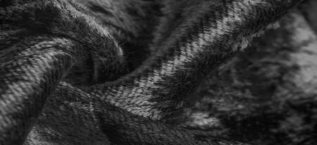 Texture, background, pattern, design, black and white velvet fabric, dense fabric of silk, cotton or...