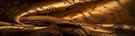 embossed pattern, composite textile, silk fabric of yellow, gold color, with a floral pattern,...