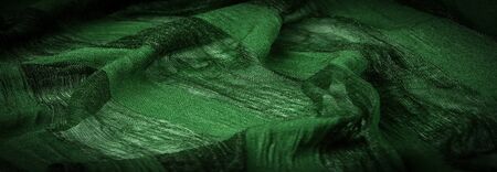 Texture, background, design, light transparent silk green fabric, Soft-touch material is available in a rainbow of colors to blend with the latest designs of your projectsの写真素材