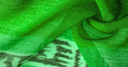 Texture, background, design, abstract pattern on fabric, large braided thread, green-white lines pattern, this fabric for your projectsの写真素材