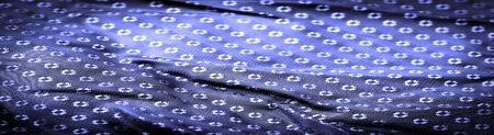Background texture, decorative ornament, sky blue silk fabric, blue sapphire, a fine, strong, soft, lustrous fiber produced by silkworms in making cocoons and collected to make thread and fabric.の写真素材