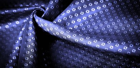 Background texture, decorative ornament, sky blue silk fabric, blue sapphire, a fine, strong, soft, lustrous fiber produced by silkworms in making cocoons and collected to make thread and fabric.の写真素材