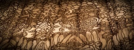 Background texture, decorative ornament, brown-beige silk fabric, floral pattern, corrugation, reef, undulation, undulation, ripples, a small wave or a series of waves on the surface of the fabric,の写真素材