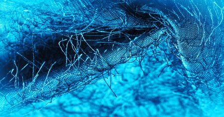 Background texture, decorative ornament, blue silk fabric, woven threads on the fabric, fluffy effect, sensation, appearance or surface texture
の写真素材