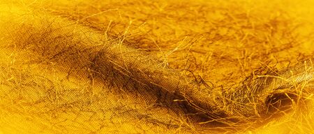 Background texture, decorative ornament, yellow gold silk fabric, woven threads on the fabric,...