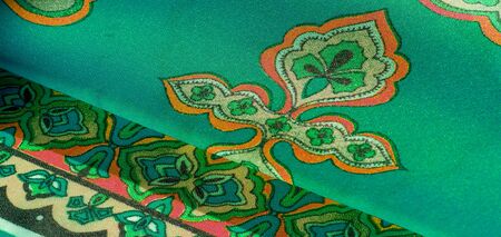 texture, background, multicolored silk fabric with a pattern of patterns on a green background,...