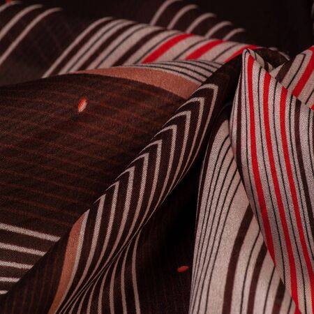 Texture, pattern, collection, silk fabric, brown background with a striped pattern of white and red lines, Spanish theme,の写真素材