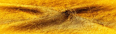 Background texture, decorative ornament, yellow gold silk fabric, woven threads on the fabric,...